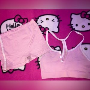 pink bralette with spandex shorts